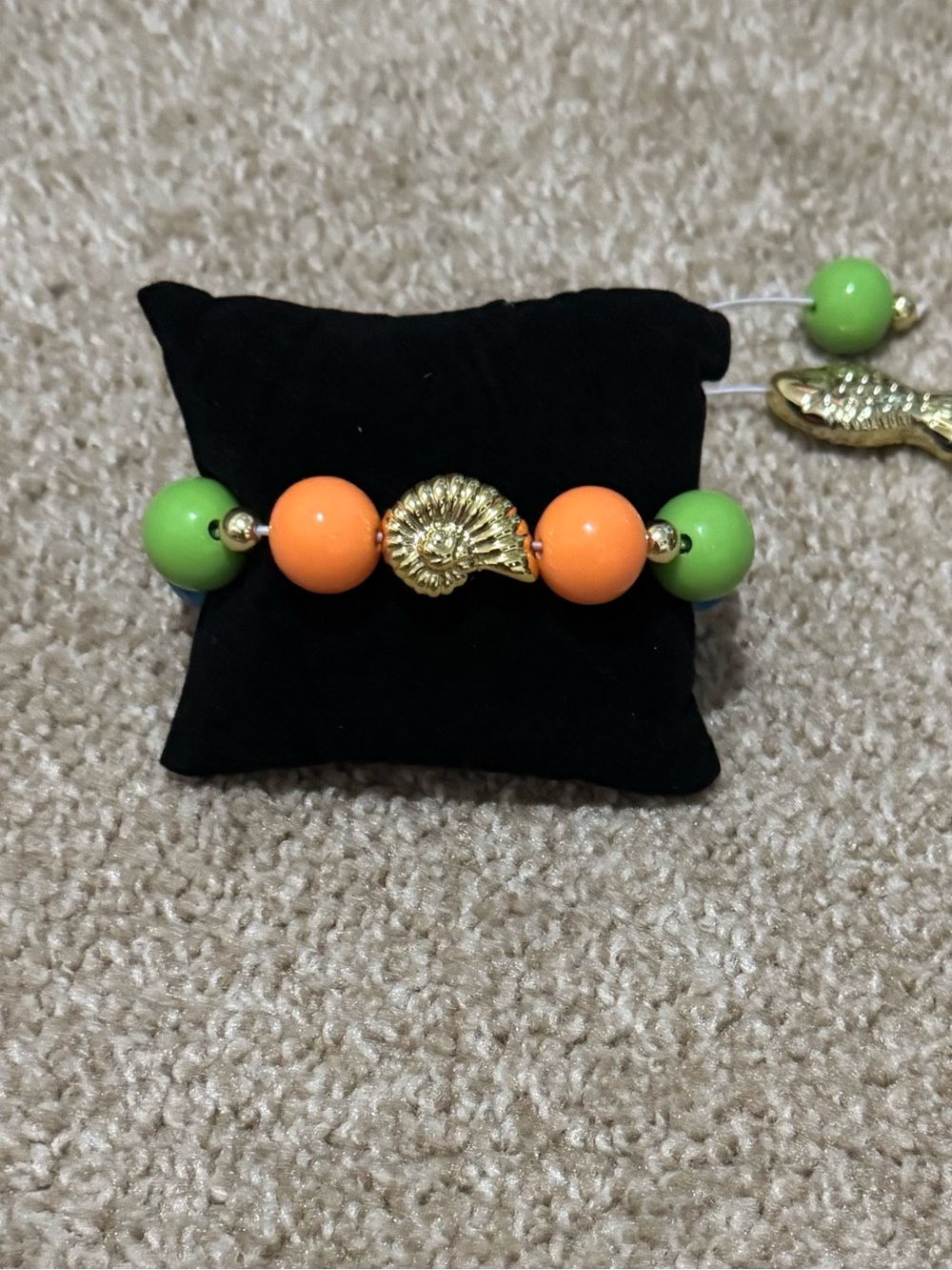 Gold Shell Bead Bracelet with Orange and Green Accent Beads